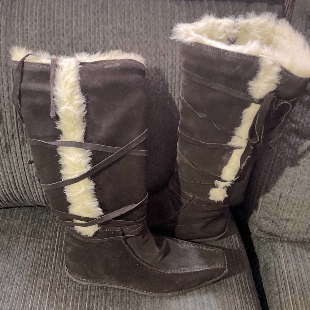 Brown Suede calf high boots never been worn.  Zip up and leather lace .